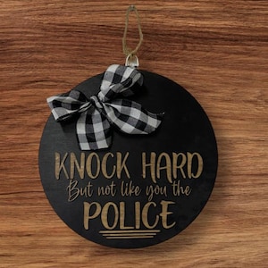Knock hard but not like you the police front door sign