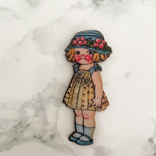 doll in summer dress wooden cutout for crafting and jewellery making. Cabage patch. toy doll