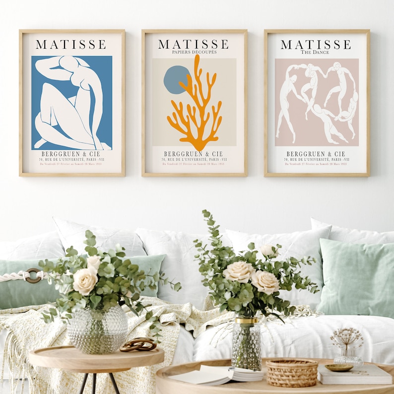 May include: Three framed art prints featuring the work of Henri Matisse. The prints are titled "Matisse", "Papiers Decoupes", and "The Dance". Each print features a different artwork in a minimalist style with a white background and black text.