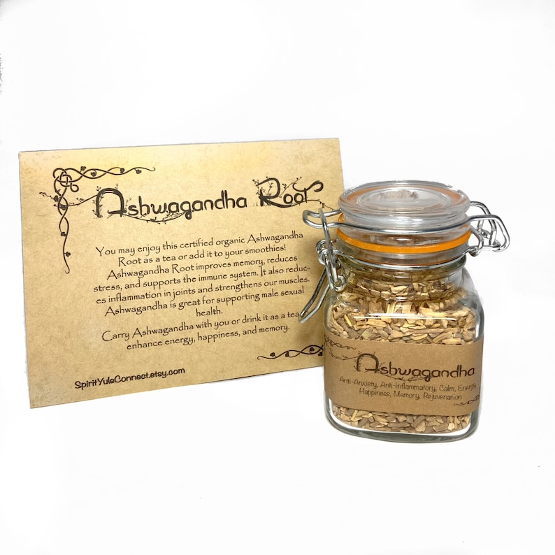May include: A glass jar with a brown lid and a label that reads "Ashwagandha" and lists its benefits. The jar is filled with dried, light brown Ashwagandha root.