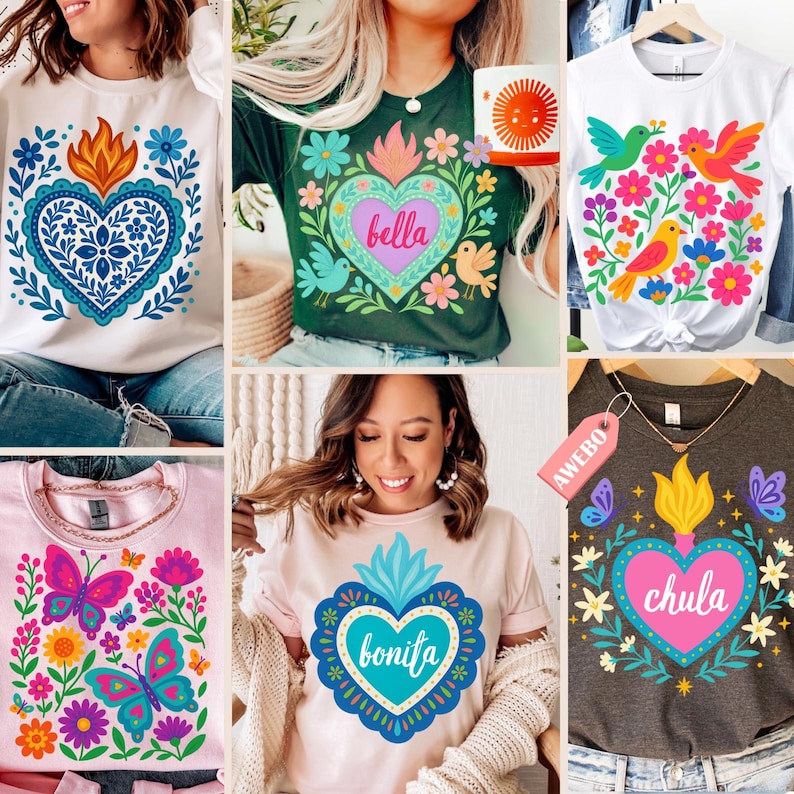 May include: Collection of graphic t-shirts featuring colorful heart and floral designs. The shirts include text such as "Bella", "Bonita", and "Chula". Designs include butterflies, birds, and suns. The shirts are in various colors, including white, pink, and dark grey.