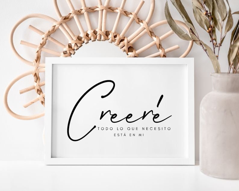 May include: White framed print with black text that reads "Creer' todo lo que necesito est&aacute; en mi" which translates to "Believe everything I need is in me".