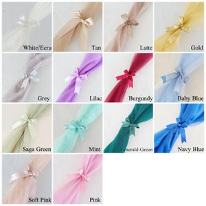May include: A grid of tulle fabric swatches in various colors, each tied with a matching satin ribbon bow. Colors include white, tan, grey, lilac, burgundy, baby blue, sage green, mint, emerald green, navy blue, soft pink, and pink.