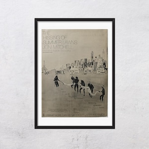 May include: Framed poster for Joni Mitchell's album "The Hissing of Summer Lawns." The artwork features a grayscale illustration of a cityscape and figures pulling a rope. Text includes the album title, artist name, and the phrase "What more can we say except listen and enjoy."