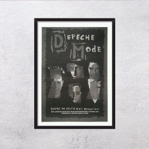 May include: Black framed poster featuring the band Depeche Mode. The poster has a dark background with the band's name and album title, "Songs of Faith and Devotion." Faces of the band members are visible. The text includes the album release date.