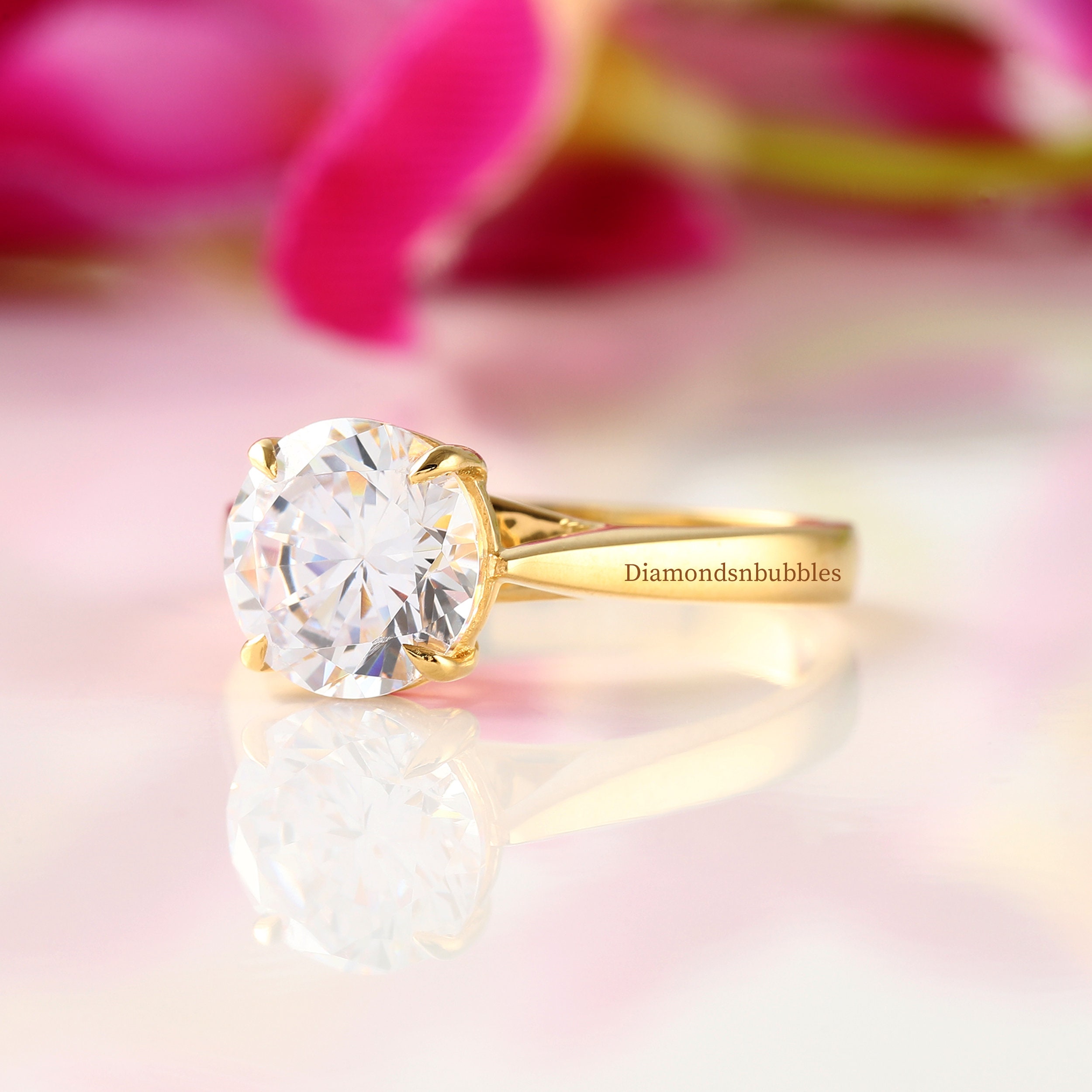Delicate solitaire 2024 engagement ring