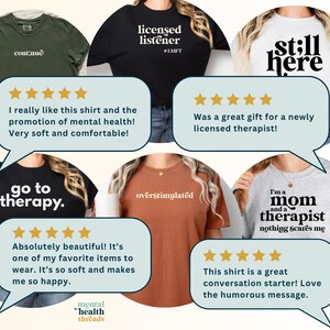 May include: A collection of six t-shirts and sweatshirts in various colors including olive green, black, white, rust, and heather gray. Each garment features printed text including continue, licensed listener, still here, go to therapy, overstimulated, and I'm a mom and a therapist nothing scares me.