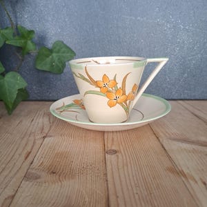 Art Deco handpainted teacup and saucer; vintage 1930s Wedgwood & Co Ltd unicorn stamp teacup