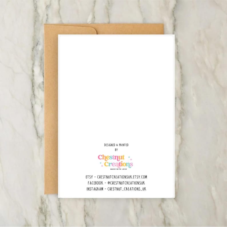 May include: A white greeting card with a brown envelope behind it. The card features the text "DESIGNED & PRINTED BY" above a colorful "Chestnut Creations" logo, followed by "ETSY - CHESTNUTCREATIONSUK.ETSY.COM", "FACEBOOK - @CHESTNUTCREATIONSUK", and "INSTAGRAM - @CHESTNUT_CREATIONS_UK".