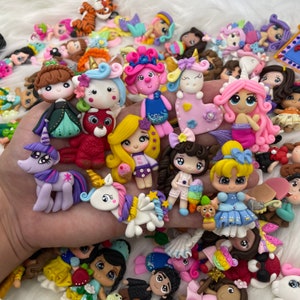 Grab bag, clearance clays, clays for bows, clay dolls, bow centers, clays for badge reel