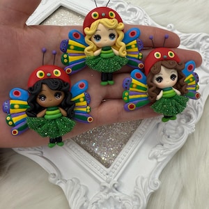 Clays for bows, butterfly clays, clay dolls, bow centers, clays for badge reel