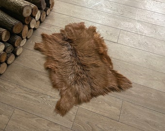 Natuurlijke geitenhuid | Echt geitenbont - leren tapijt - zachte geitenleer - geitenhuid - plaid bont - woondecoratie - rustiek plaid - tapijt geitenbont