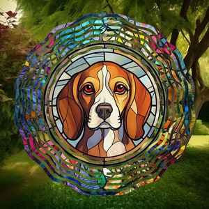 May include: A colourful metal wind spinner featuring a stained glass design of a beagle dog. The dog has brown, white and black fur. The wind spinner is circular in shape with multiple layers of metal.