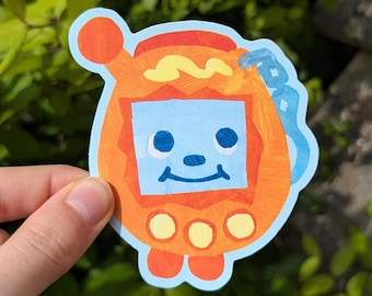 Pegatina de vinilo de Tamagotchi