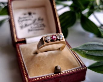 IMPRESIONANTE anillo vintage de oro de 9 quilates con rubí y topacio blanco de 1970. ¡Planes de pago disponibles! (ref00o)