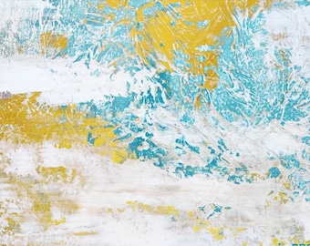 May include: Abstract painting with a white background and blue and gold accents. The painting has a textured look and is framed in a thin, white frame.