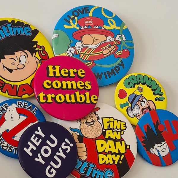 Vintage badges, 80's, 90's. Retro Badges. Dennis the Menace, Ghostbusters, Beano, Goonies. Collectable. Lot 19.