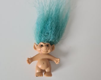 Little tiny troll doll with Turquoise Hair. Retro troll doll.
