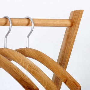 Leaning wall coat rack with shelves made of solid oak image 3