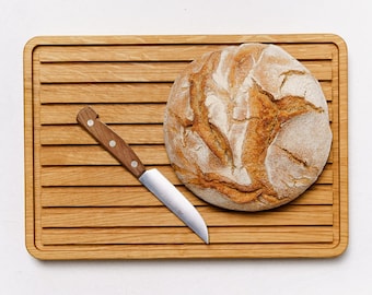 KADE chopping board with bread grooves made of solid oak