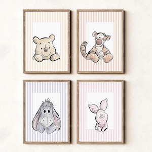May include: Four framed wall art prints featuring Winnie the Pooh, Tigger, Eeyore, and Piglet. Each character is illustrated in a sketch style against a white background, framed by vertical stripes in yellow, orange, purple, and pink respectively.