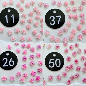 May include: A collection of small, multi-petaled flower cabochons in various shades of pink and purple. The image is divided into four sections, each labeled with a black circular tag featuring the white numbers 11, 37, 26, and 50.