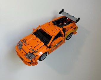 Soporte de pared para el coche LEGO® TECHNIC™ Toyota Supra MK4 (42204) de Rápido y Furioso