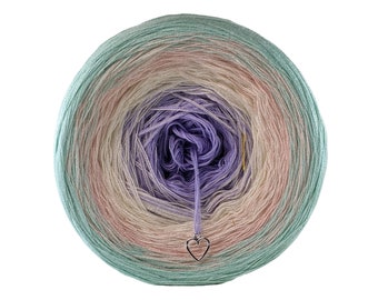 May include: A ball of yarn with a gradient of light green, pink, cream, and purple. The yarn is wound around a center core and has a silver heart charm attached.