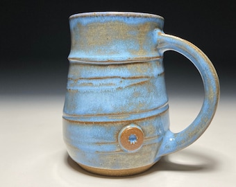 Ceramic mug, Wheel-thrown stoneware pottery in Arctic Blue glaze, 12 ounce capacity.