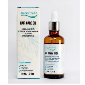 May include: A brown glass bottle of hair care oil with a white dropper and a white box. The box and bottle have the brand name "HairextreM". The box reads "Hair Care Oil" and lists ingredients and usage areas. The bottle contains 50 ml.