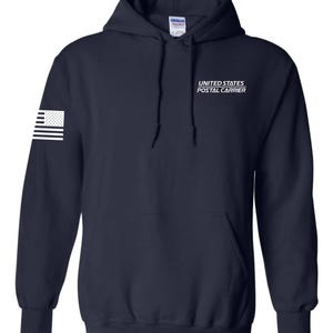 May include: Navy blue hooded sweatshirt with the text "UNITED STATES POSTAL CARRIER" in white. A white American flag is on the left sleeve. The sweatshirt has a front pocket and a drawstring hood.