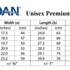 May include: A white graphic with the brand name "GILDAN" and the text "Unisex Premium Cotton". A table displays measurements in inches and centimeters for width, length, and CB sleeve for various sizes, from XS to 2XL.