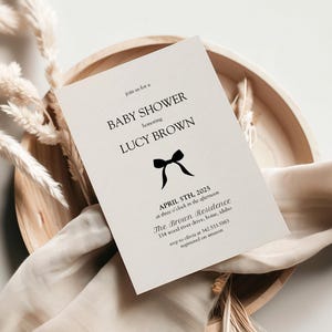 Invitaciones minimalistas para baby shower con lazo negro, impresas y enviadas