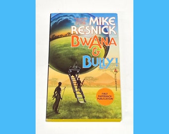 May include: A paperback book cover with a yellow, green, and blue illustration of a globe with a ladder leading up to it. The title of the book is "BWANA & BULLY!" by Mike Resnick.