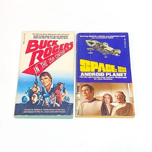 Buck Rogers - Space 1999 - TV Series Science Fiction Book lot of 2 - Sci Fi Paperback - Vintage Paperback Book - Pre Owned Book - Very Good