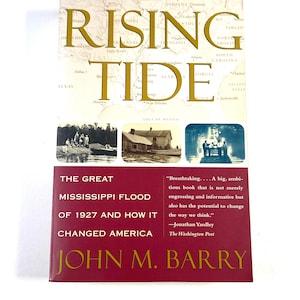May include: A book titled Rising Tide by John M. Barry with a cover featuring a map of the United States, three historical black and white photographs of flood scenes, and a maroon lower section with white text describing the 1927 Mississippi flood.