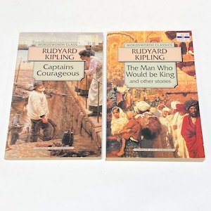May include: Two paperback books by Rudyard Kipling. The book on the left is titled "Captains Courageous" and the book on the right is titled "The Man Who Would Be King and other stories". Both books are part of the Wordsworth Classics series.