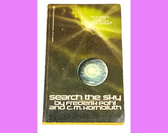 May include: A vintage paperback book cover with a dark blue and yellow color scheme. The cover features a planet with a bright light in the center, surrounded by stars. The title of the book is "Search the Sky" by Frederik Pohl and C.M. Kornbluth. The text "The Stunning Novel of Tomorrow's Grace Messiah" is also on the cover.