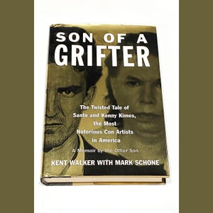 May include: A gold-colored book cover with the title "Son of a Grifter: The Twisted Tale of Sante and Kenny Kimes, the Most Notorious Con Artists in America. A Memoir by the Other Son." by Kent Walker with Mark Schone.