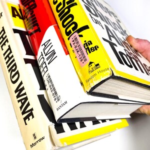 a person holding a book in their hand