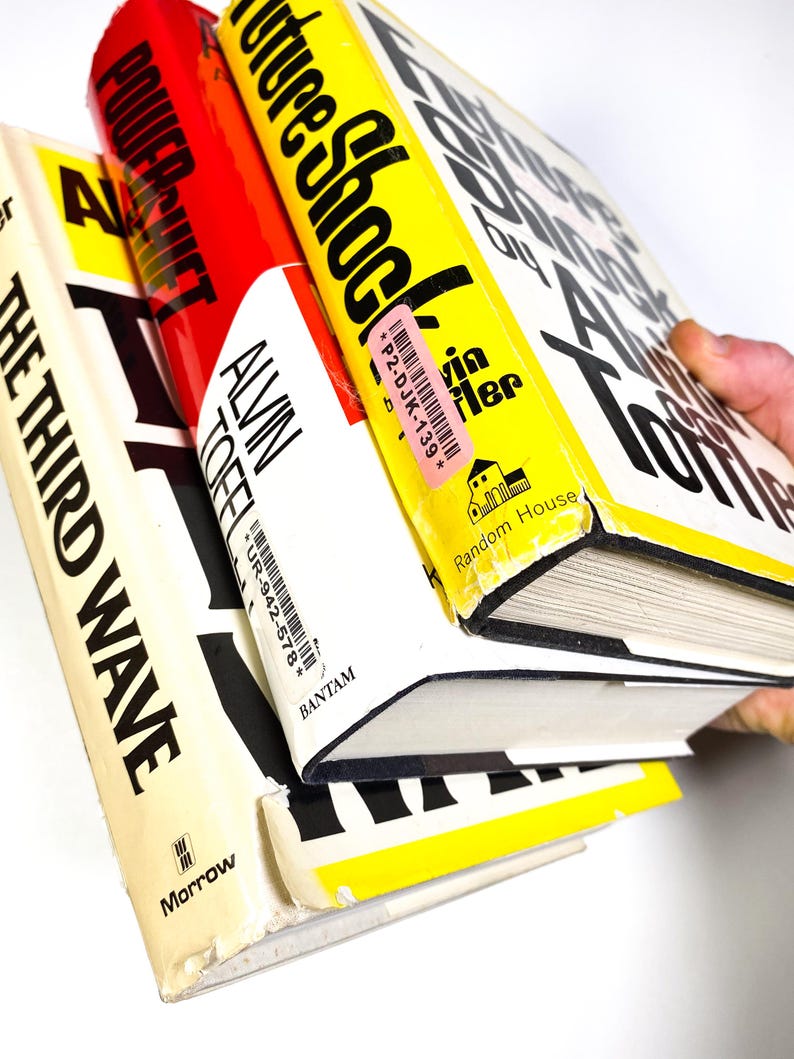 a person holding a book in their hand