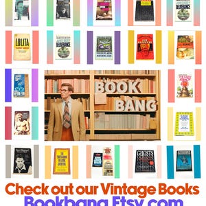 a man standing in front of a book shelf filled with books