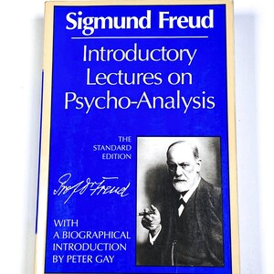 a blue book with a picture of a man holding a cigarette