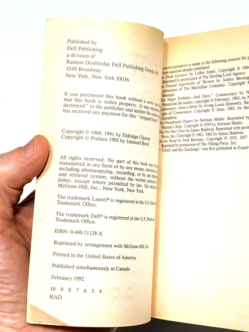 May include: Open book pages with text from Dell Publishing, including copyright information and ISBN. The book's pages are off-white with black text. The book is printed in the United States of America.