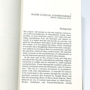 The image is a page from a book or document, featuring a section titled "MAJOR CLINICAL CONTROVERSIES" with a background section discussing the history and development of the therapeutic approach to schizophrenia.