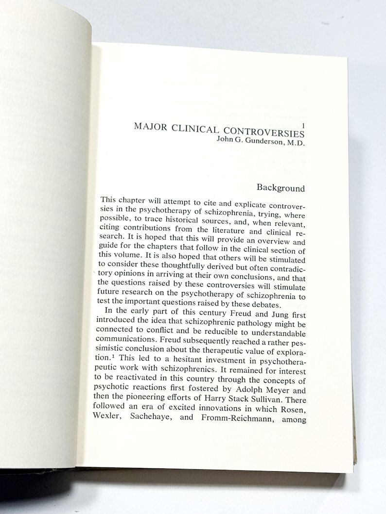 The image is a page from a book or document, featuring a section titled "MAJOR CLINICAL CONTROVERSIES" with a background section discussing the history and development of the therapeutic approach to schizophrenia.