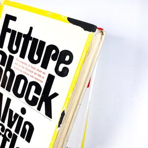 a book that is open on a white surface