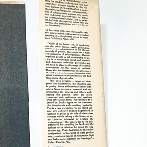 [The image contains text, but it is not clear enough to transcribe accurately without speculation. It appears to be a page from a book or document, possibly a newspaper or magazine article, with a photograph of a person's face on the right side. The text is too small and blurry to read in detail, and there are no clear visual cues to identify the specific content or context.]