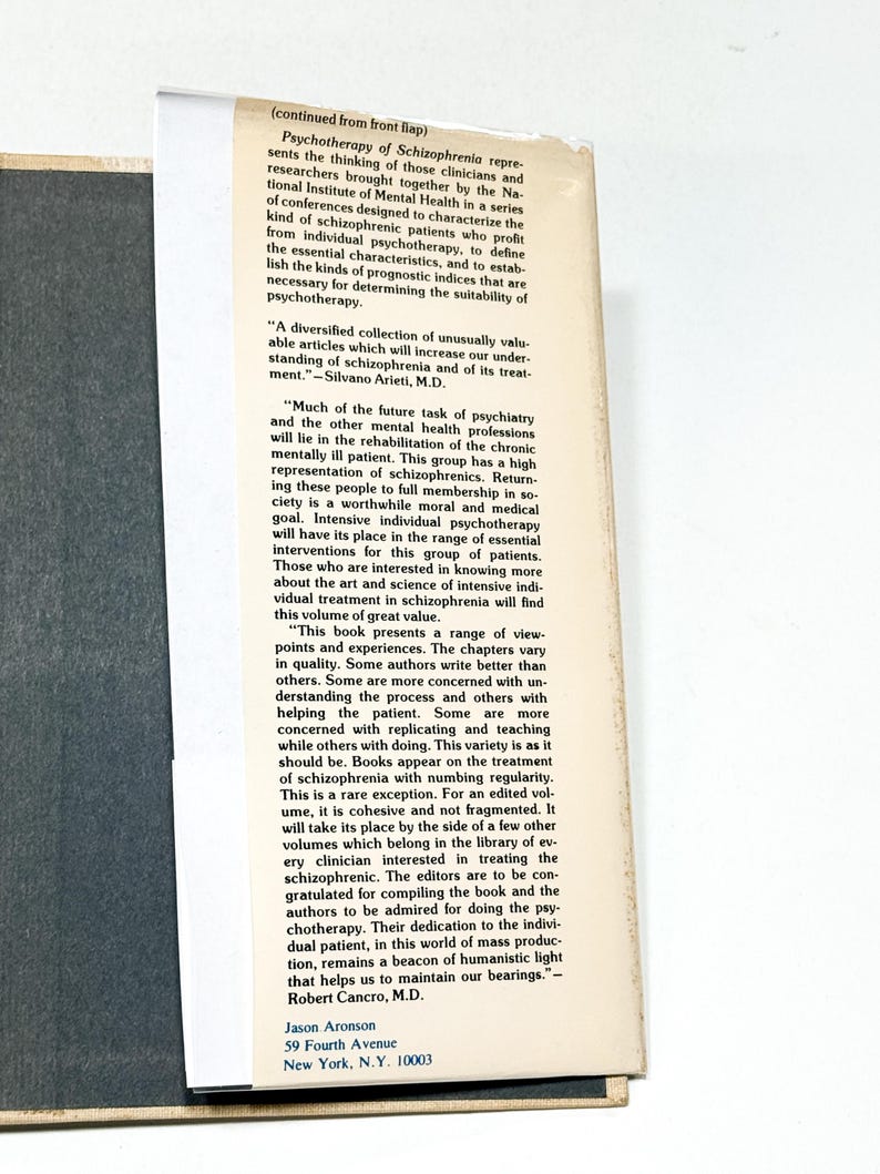 [The image contains text, but it is not clear enough to transcribe accurately without speculation. It appears to be a page from a book or document, possibly a newspaper or magazine article, with a photograph of a person's face on the right side. The text is too small and blurry to read in detail, and there are no clear visual cues to identify the specific content or context.]