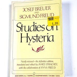 a book with a yellow cover sitting on top of a table